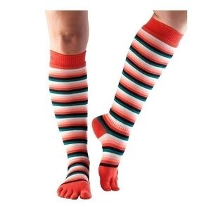 Toesox Half Toe Scrunch Knee High Grip Socks in the color FIESTA M